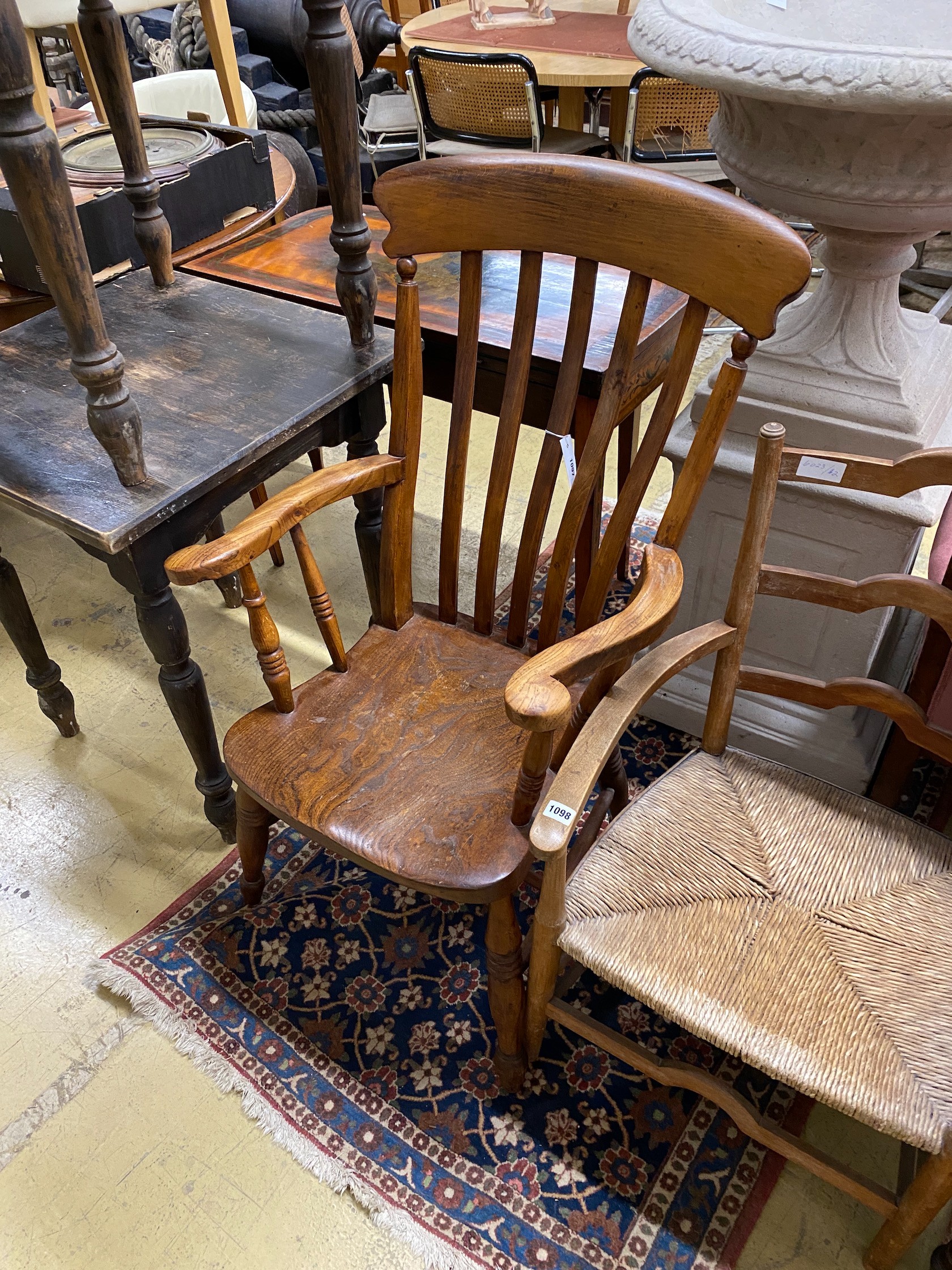 A Victorian elm and beech Windsor lathe back armchair, width 59cm, depth 49cm, height 108cm